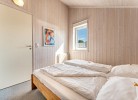 Komfortables Schlafzimmer mit Doppelbett