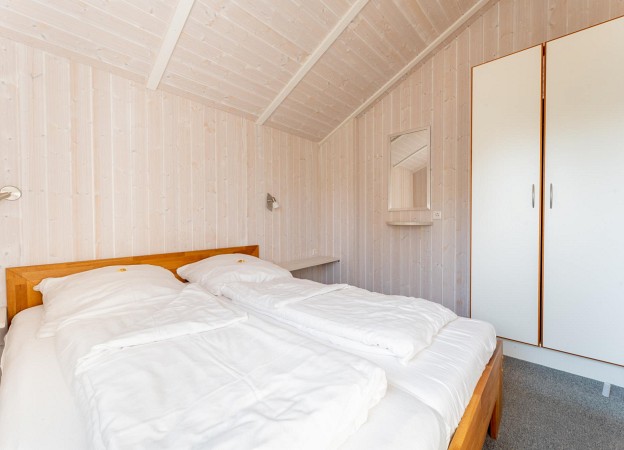 Behagliches Schlafzimmer mit Doppelbett
